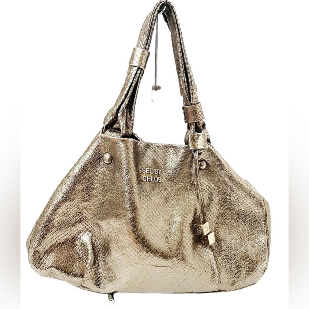 See by Chloé gold purse -used twice - excellent condition - leather